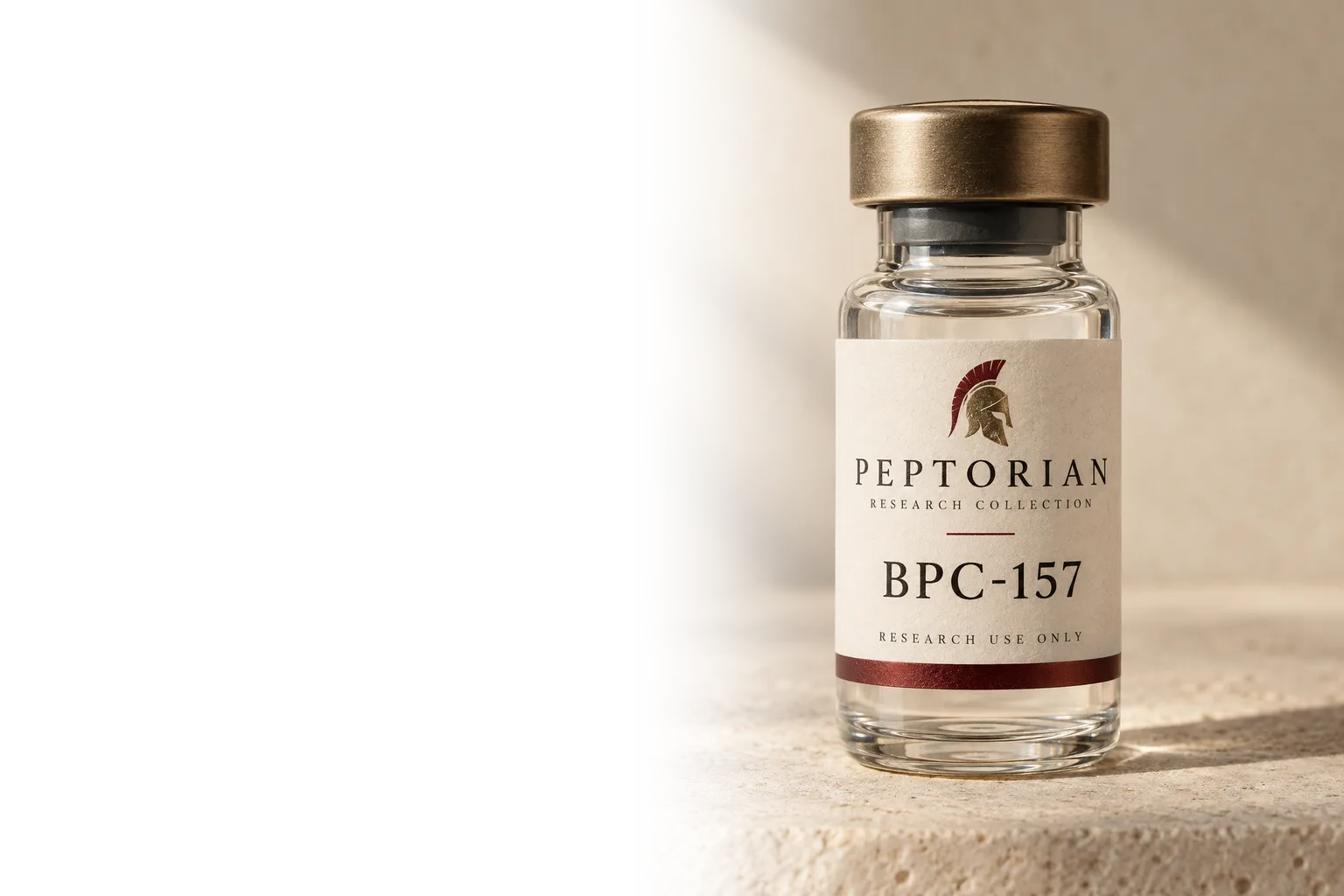 Peptorian BPC-157 research vial with a bronze cap and an ivory label showing the helmet emblem, on pale stone in warm light
